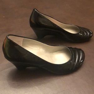 Baby doll style, black patent pumps, size 7.5 US